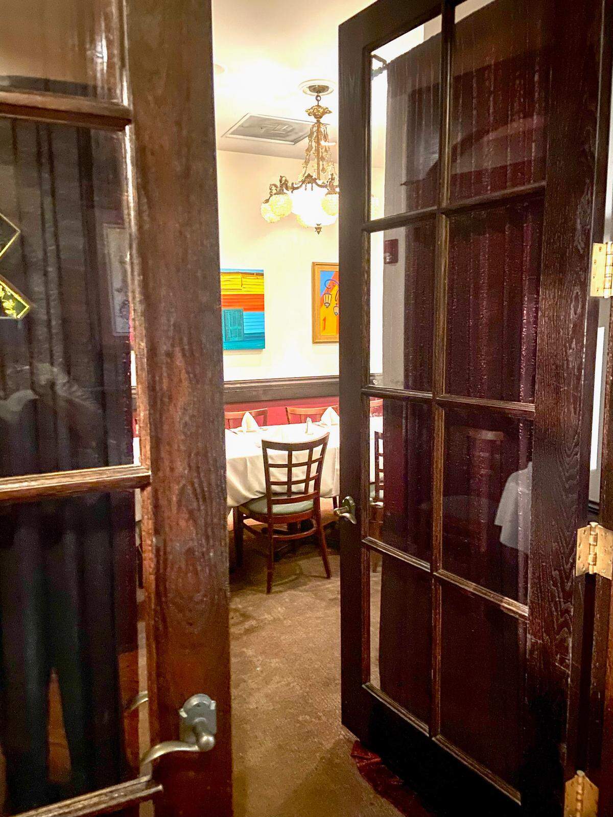 Two curtained doors lead into a private dining room at Piropos. Security guards stood at the door as Travis Kelce and Taylor swifted ate dinner, a restaurant manager said.