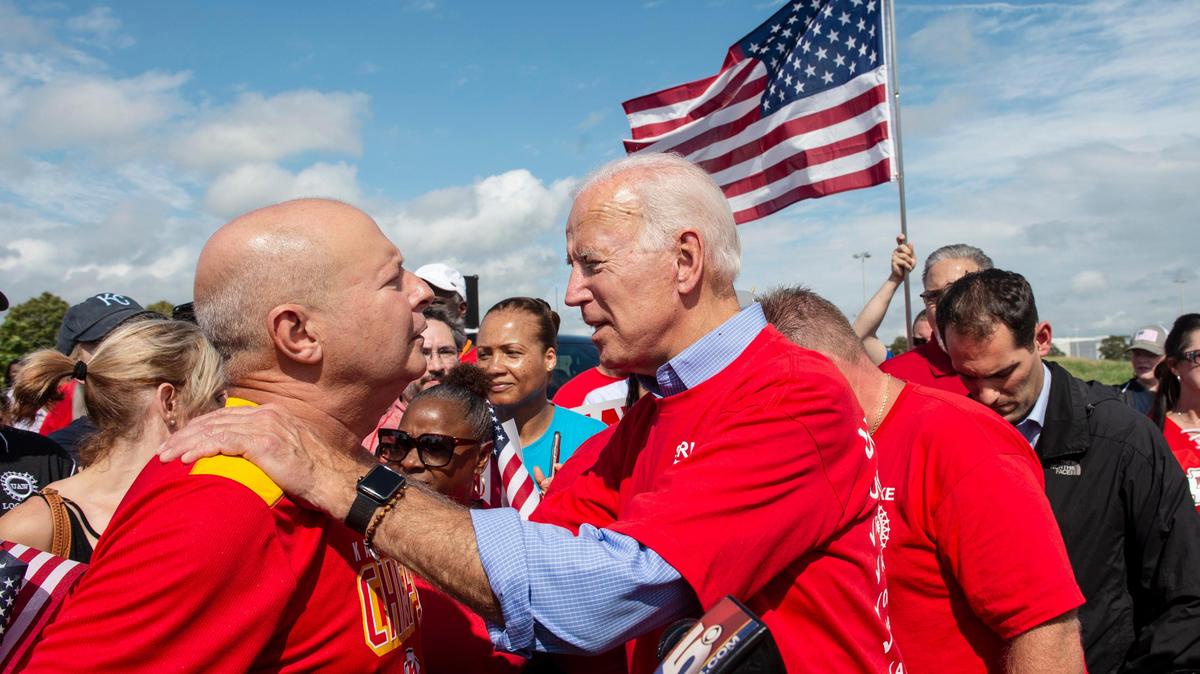 Paul J. Wrabec, chairman of the Jackson County, Missouri, Democratic committee visited with former vice president and current presidential candidate Joe Biden Sunday, September 22, 2019, during a campaign stop to visit with UAW strikers at the General Motors Fairfax Assembly Plant in Kansas City, Kansas.