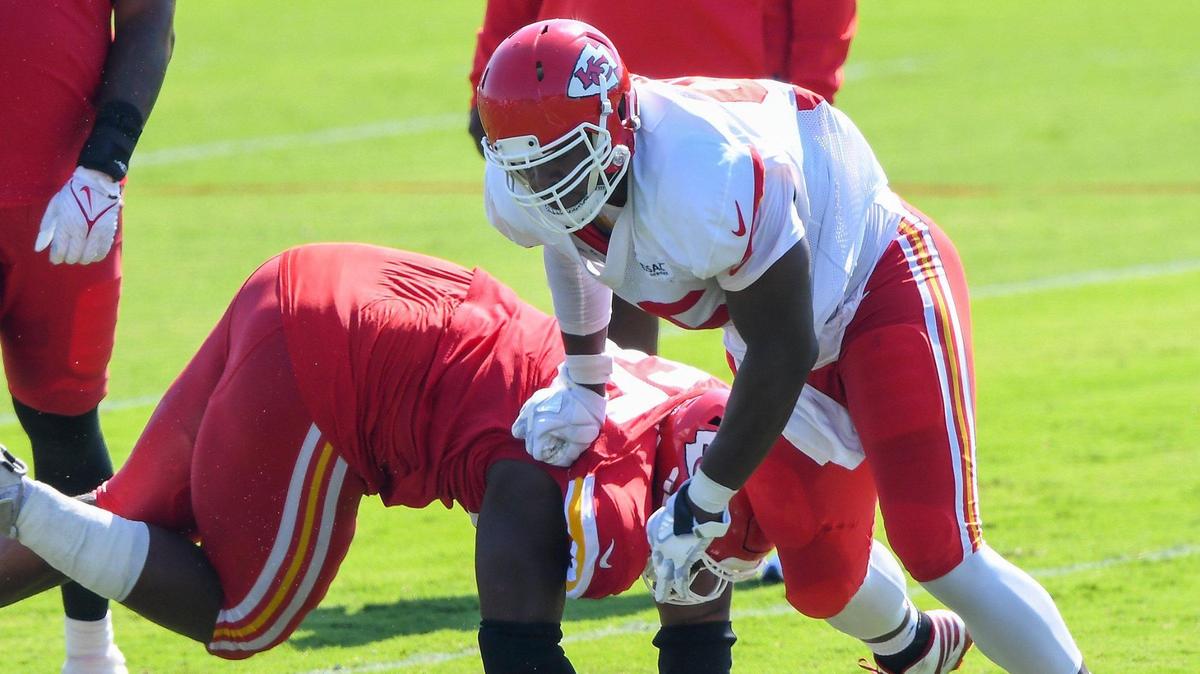 Defensive tackle Chris Jones, right, brings down rookie offensive lineman during one-on-ones at Kansas City Chiefs training camp at Missouri Western State University in St. Joseph Tuesday, Aug. 17, 2021.