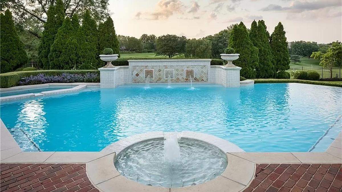 The backyard pool of 2404 W. 114th St. overlooks the Hallbrook golf course. The Leawood home was listed for $4.5 million on Zillow in June 2024.