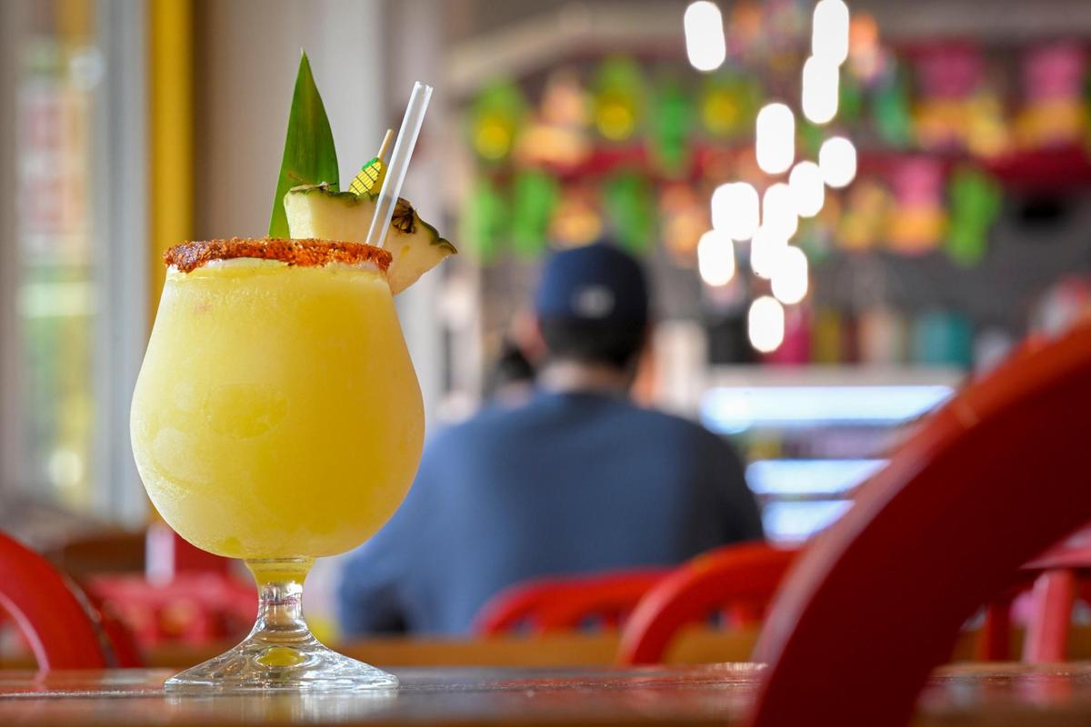 The frozen pineapple Fuego Margarita is one of Taco Naco’s more popular drinks.