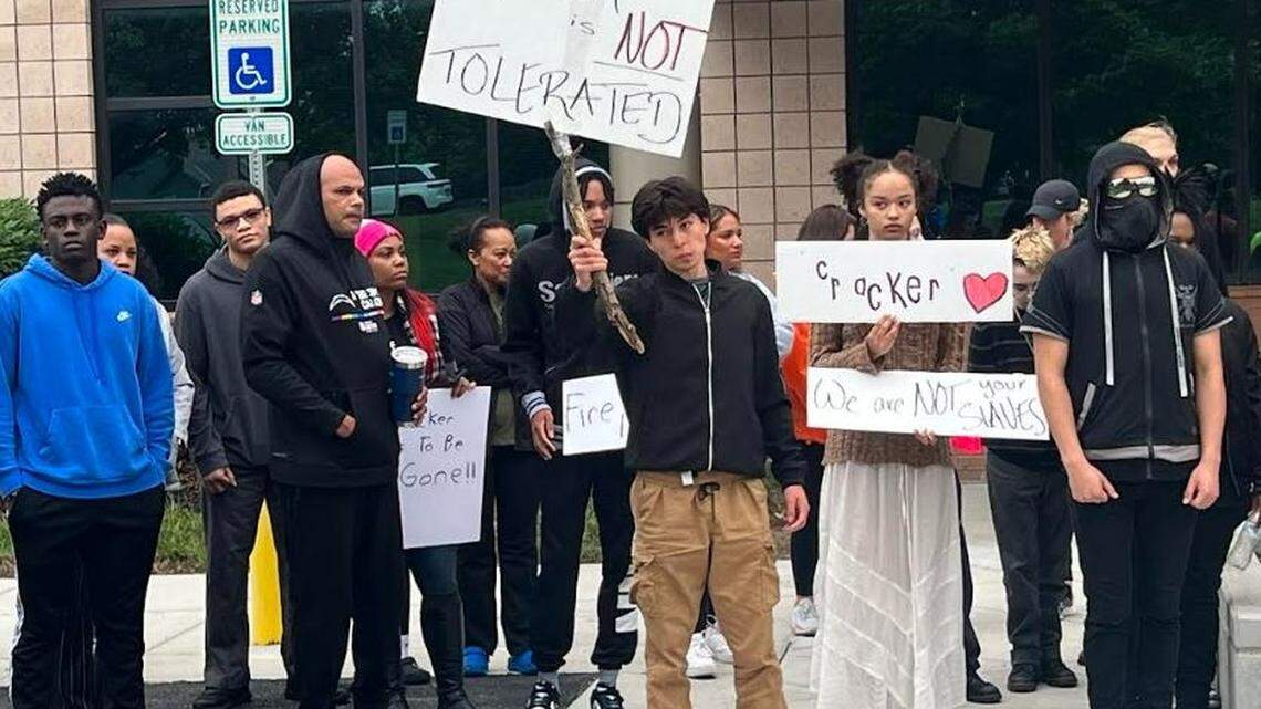More than 40 Olathe students, parents and community members gathered in front of school district headquarters to demand officials take incidents of racism more seriously.