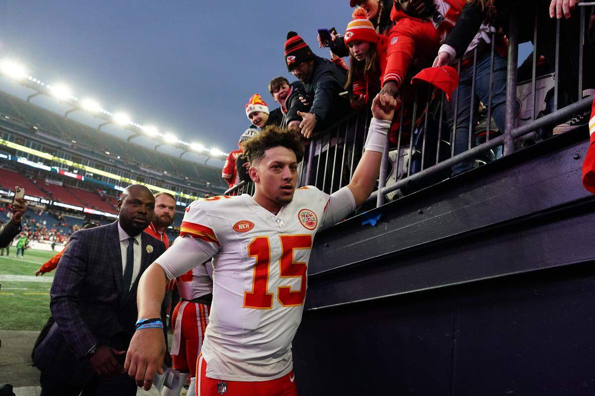 Kansas City Chiefs quarterback Patrick Mahomes (15) exits the field after defeating the New England Patriots at Gillette Stadium on Dec. 17, 2023.
