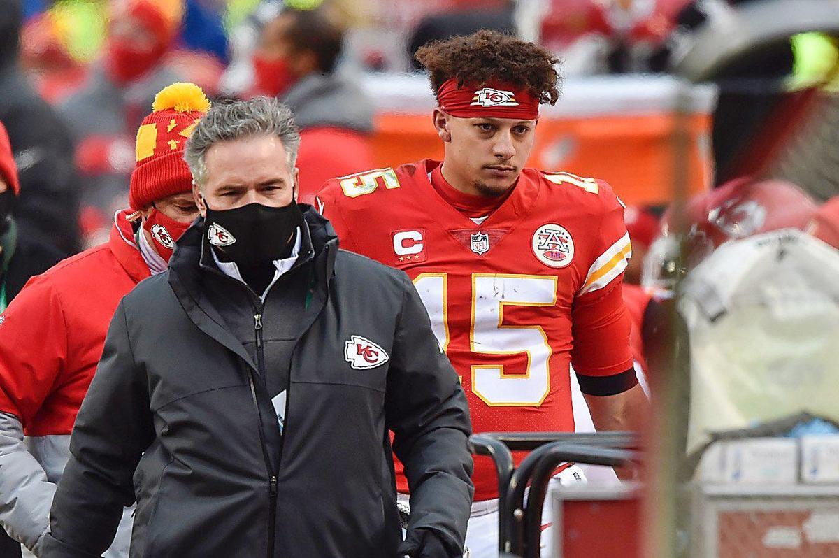 Kansas City Chiefs quarterback Patrick Mahomes heads for the locker room to be examined after taking a hit to the head in the fourth quarter against the Cleveland Browns Sunday, January 17, 2021, at Arrowhead Stadium in Kansas City, Missouri. Mahomes did not return to the game.