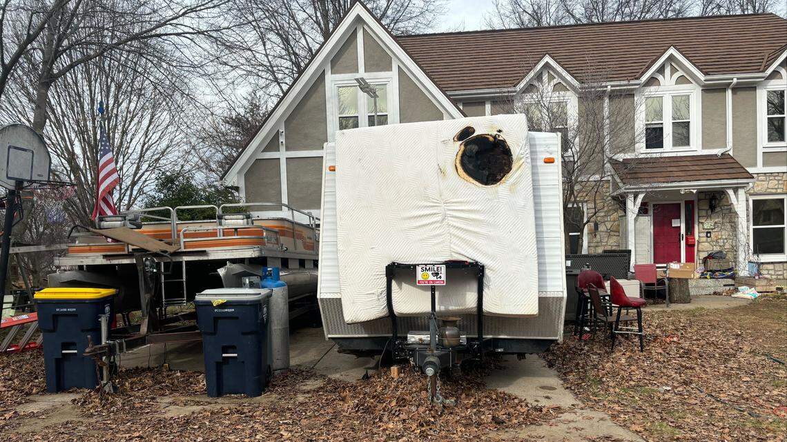 A boat and trailer and other items remained outside of the home of Jeffrey Traviss King, who was charged with murder in the death of a neighbor, Chris Wells, during a fight on Monday. According to court documents, police have been aware of a long series of confrontations that escalated over time between King and neighbors in the area. Well’s wife told police that since her family moved to the area about two years ago, multiple incidents involving King were reported to the homeowner’s association.