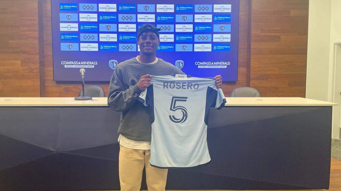 New Sporting KC defender Dany Rosero poses with his jersey as part of his introductory press conference on Thursday, March 30.