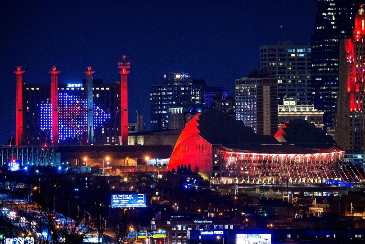 The Marriott Hotel in downtown Kansas City displays an ever-changing tribute to the Chiefs while the pylons on Bartle Hall and the front of the Kauffman Center for the Performing Arts glow red to celebrate the Super Bowl-bound team.