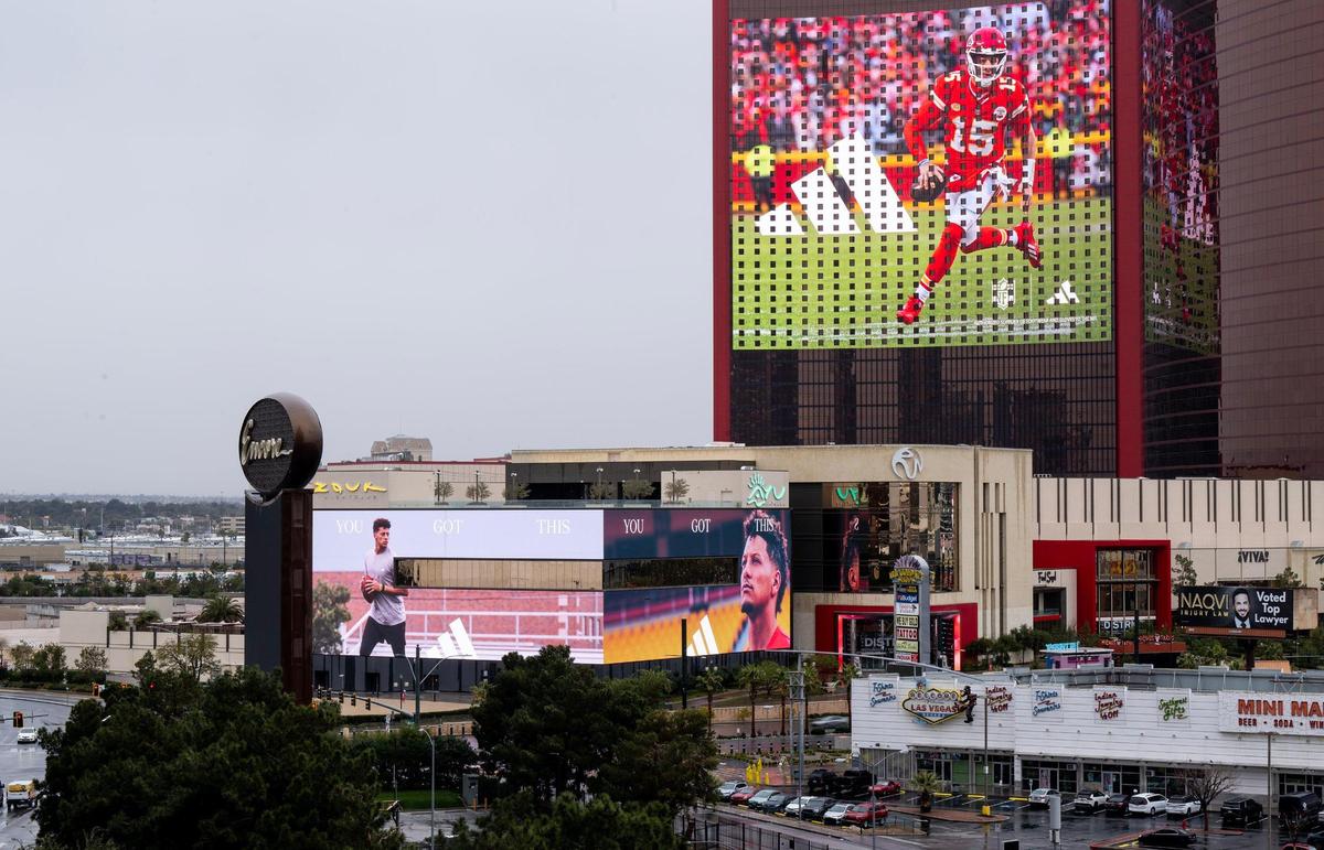 A new advertising campaign launched by Adidas features Kansas City Chiefs quarterback Patrick Mahomes, here displayed on the Resort World hotel, on Monday, Feb. 5, 2024, in Las Vegas.