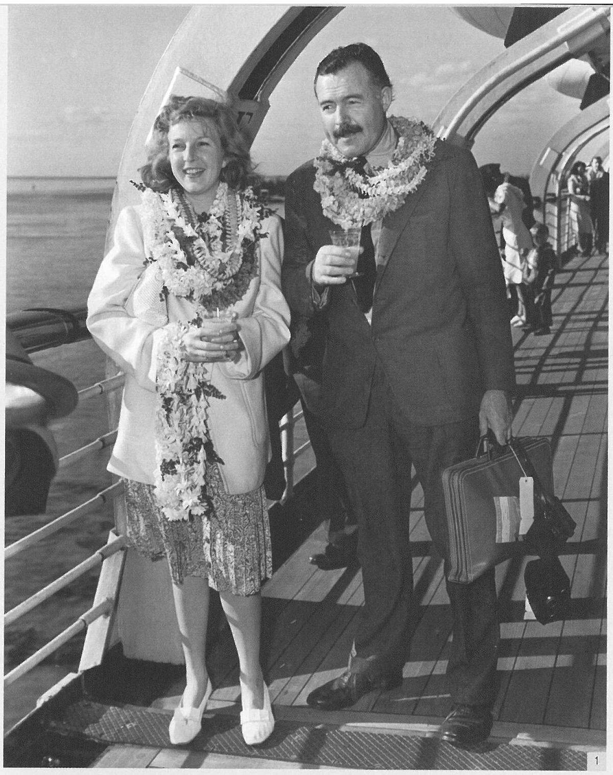 Ernest Hemingway and his third wife, Martha Gellhorn, on board the SS Matsonia arriving in Hawaii en route for China, 1941.