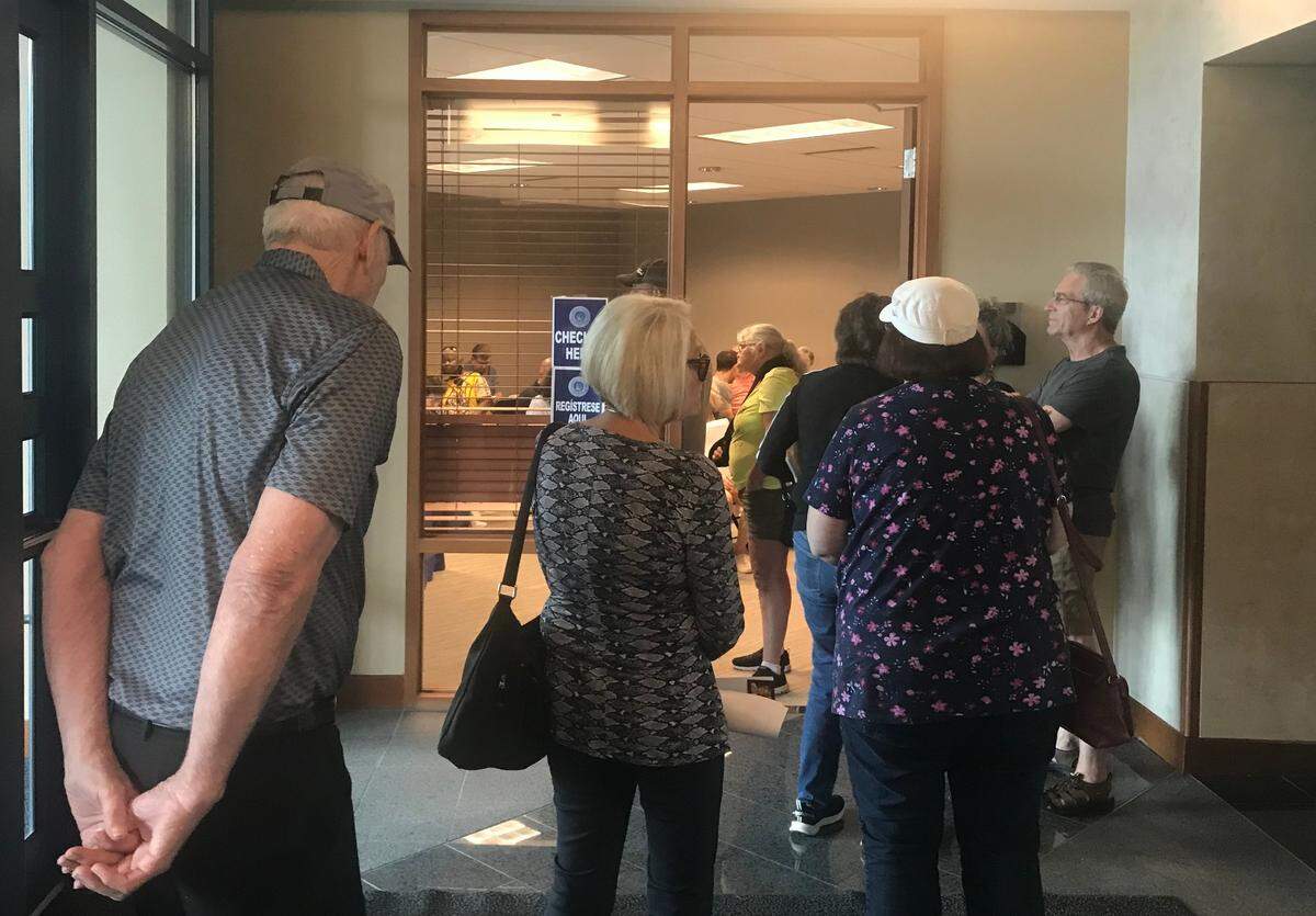 Jackson County homeowners wait in line to check in for their property value review appointments at 1300 Washington St. on Tuesday, June 27, 2023.