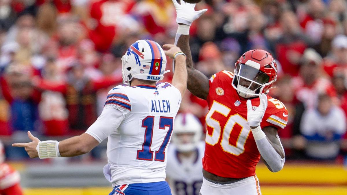 Kansas City Chiefs linebacker Willie Gay (50) tries to deflect a pass by Buffalo Bills quarterback Josh Allen (17) during an NFL football game on Sunday, Dec. 10, 2023, in Kansas City.