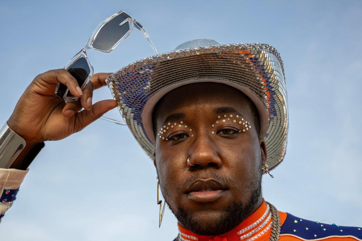 Dillon Dixon, from Washington state, shows off his mirrorball cowboy hat and jewels before attending the last stop of Beyoncé’s Renaissance World Tour at GEHA Field at Arrowhead Stadium on Sunday, Oct. 1, 2023, in Kansas City.