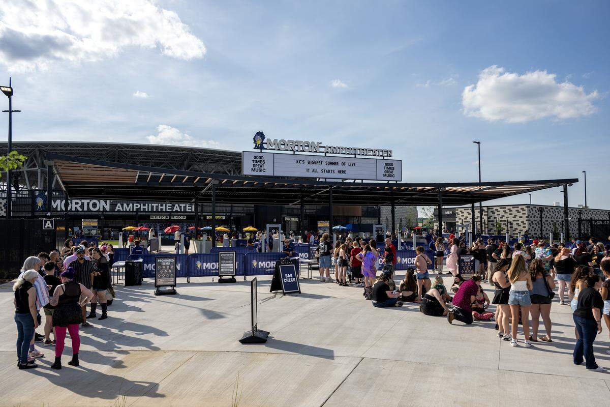 People stand in line to enter the Morton Amphitheater on Wednesday, June 3, 2026, in Riverside.