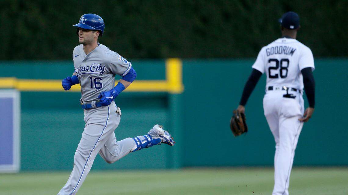 The Royals’ Andrew Benintendi rounds the bases past Detroit Tigers third baseman Niko Goodrum after hitting a solo home run during the second inning on Friday, April 23, 2021, in Detroit.