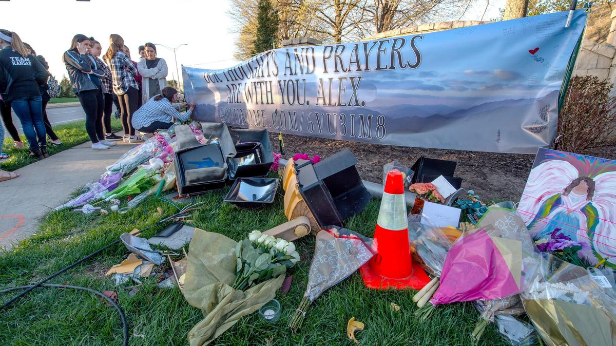 Days after the April 2019 crash, a banner in memory of Alex Rumple at the corner of West 123rd Street and Switzer Road was signed by people for the middle school student. Rumple was killed when a car ran off the road and struck her as she walked home from school. Parts of the traffic signal struck by the vehicle were scattered among the flowers left at the memorial.