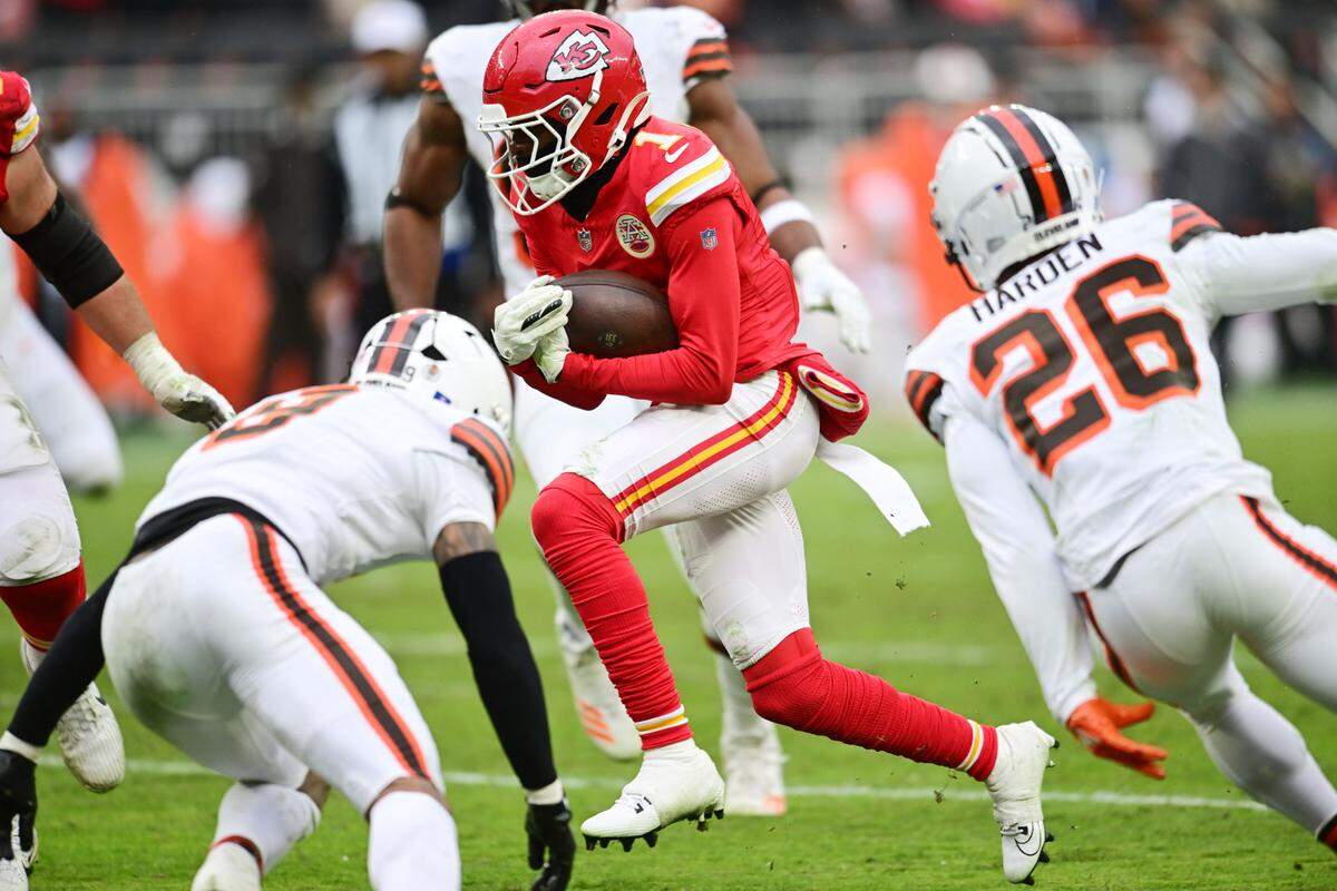 Kansas City Chiefs wide receiver Xavier Worthy runs with the ball during an NFL Week 15 game against the Cleveland Browns at Huntington Bank Field in Cleveland, Ohio on Sunday, Dec. 15, 2024.