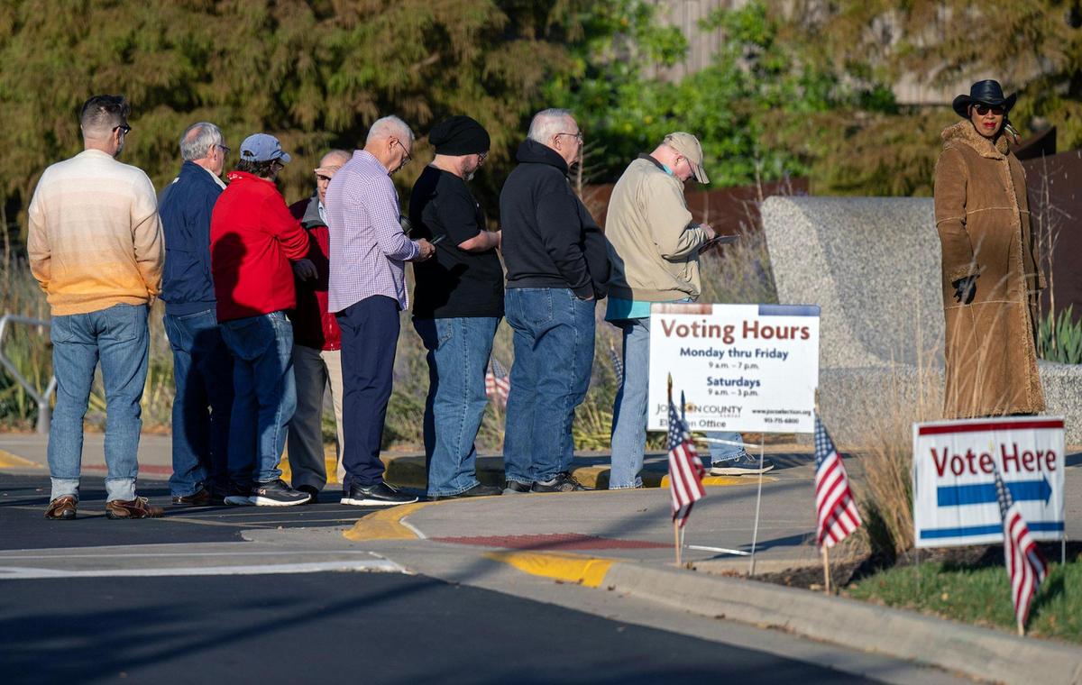 A line of Johnson County residents formed outside The Arts and Heritage Center in Overland Park for the first day of in-person advance voting for the 2024 General Election on Saturday, October 19, 2024.