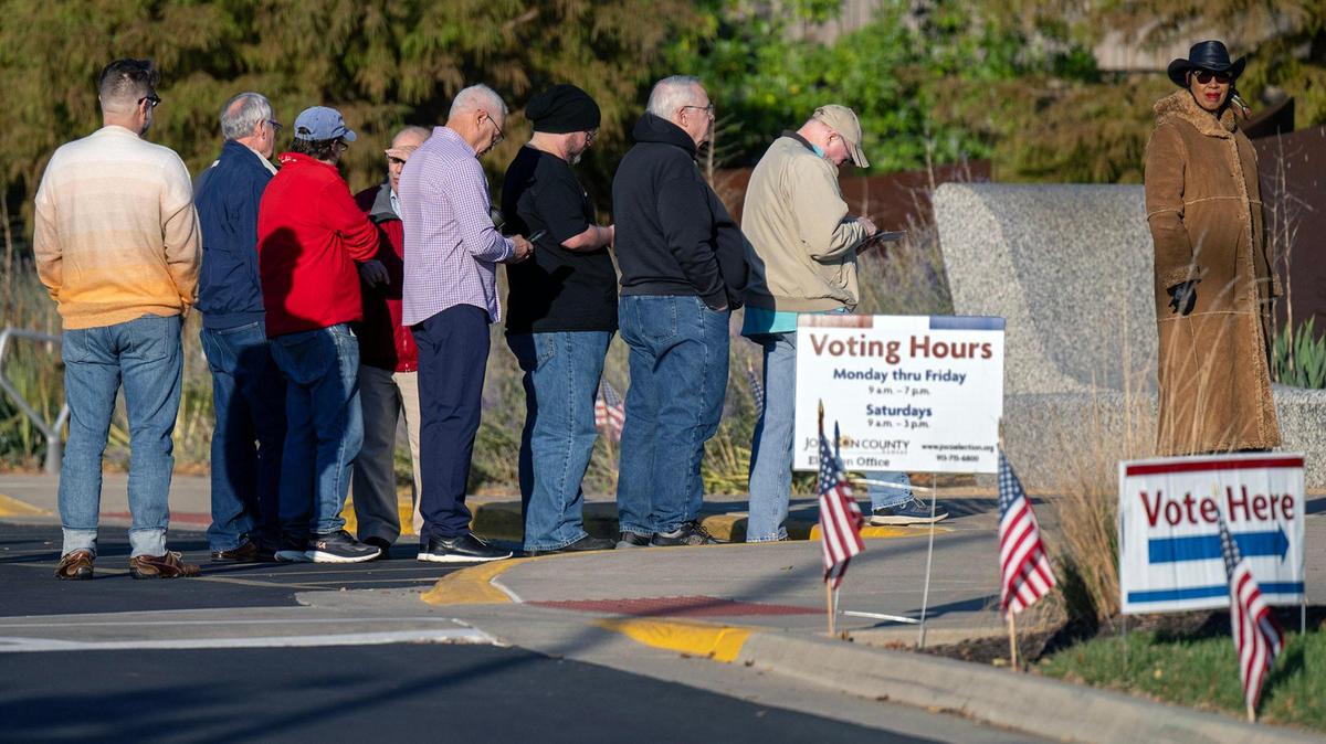 A line of Johnson County residents formed outside The Arts and Heritage Center in Overland Park for the first day of in-person advance voting for the 2024 General Election on Saturday, October 19, 2024.