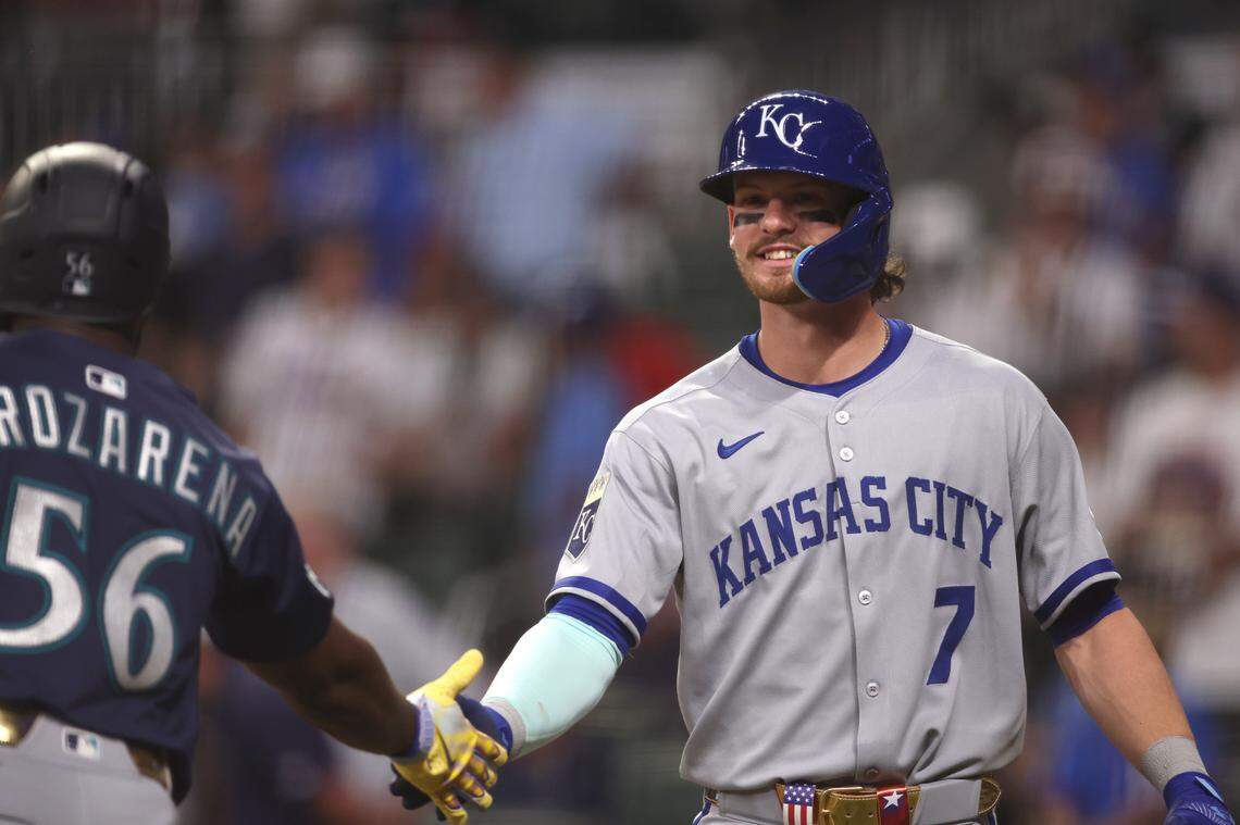 American League shortstop Bobby Witt Jr. (right) of the Kansas City Royals celebrates with outfielder Randy Arozarena of the Seattle Mariners after scoring in the ninth inning during the 2025 MLB All-Star Game at Truist Park in Atlanta on Tuesday, July 15, 2025.