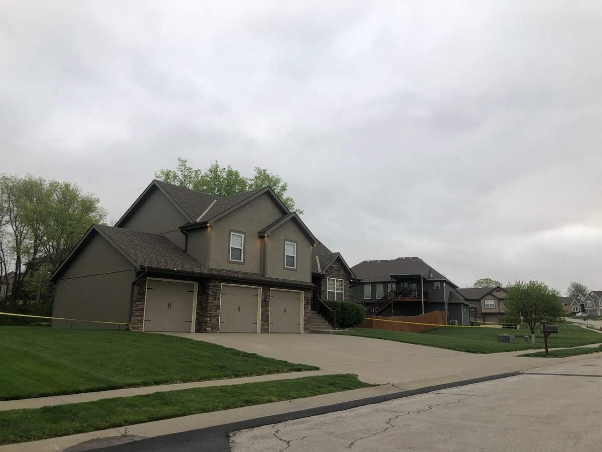 Kansas City police and a Missouri Highway Patrol trooper were involved in a fatal shooting of a homicide suspect following a pursuit that ended in Platte County. Crime scene tape remained around a home near Northwest 132nd Street and Running Horse Road Wednesday morning.