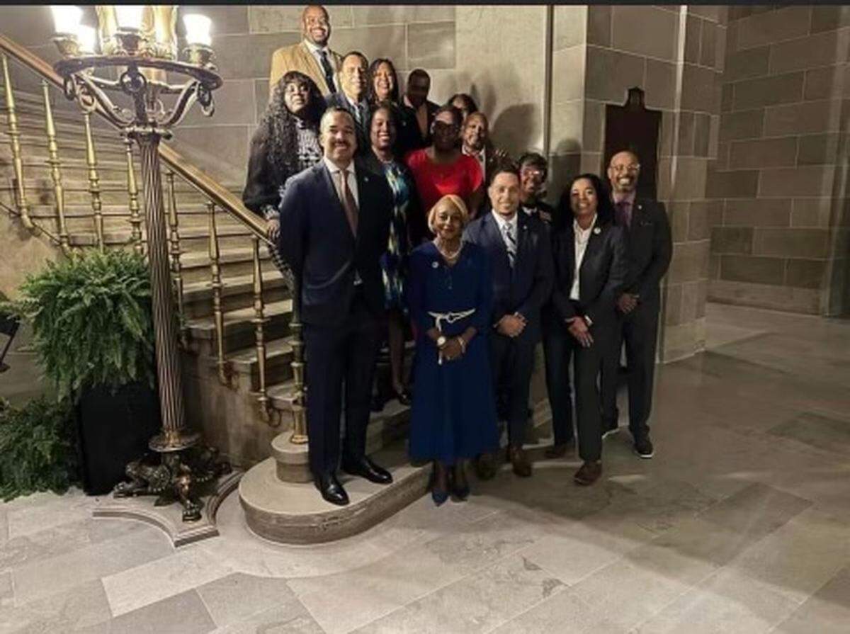 Members of the Missouri Legislative Black Caucus stand for a photograph inside the Missouri Capitol.