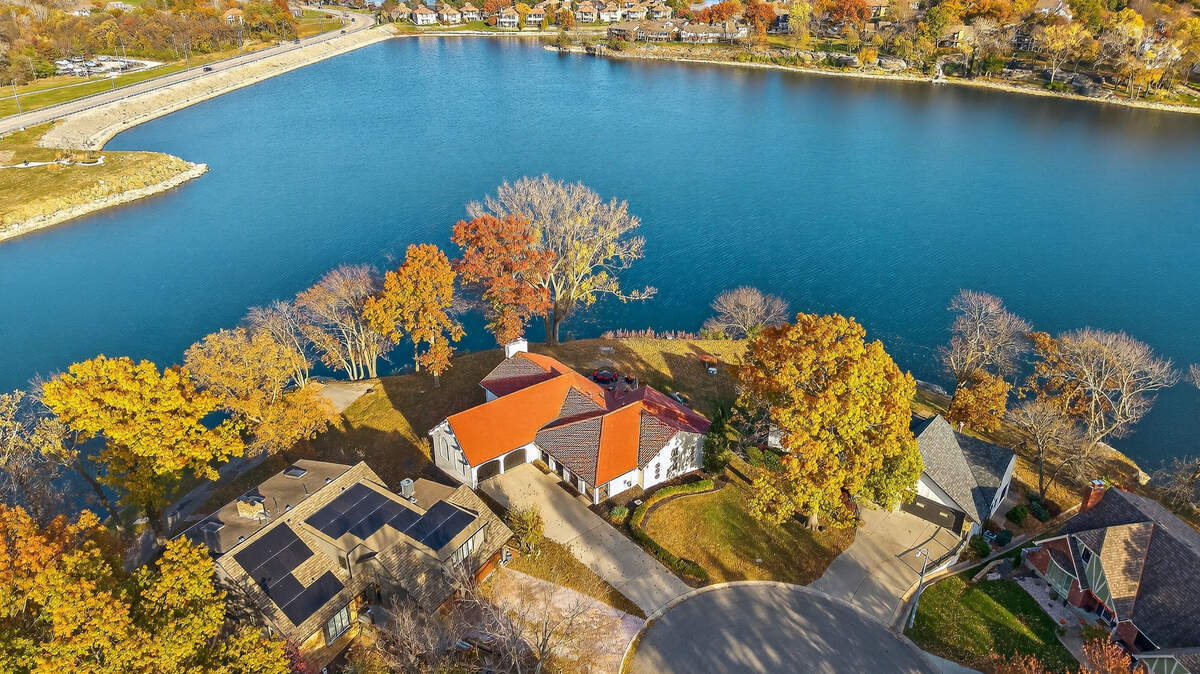 An aerial view of 102 NW Hackberry St. in Lee’s Summit. Right behind the home is clear view of Lakewood Lakes.
