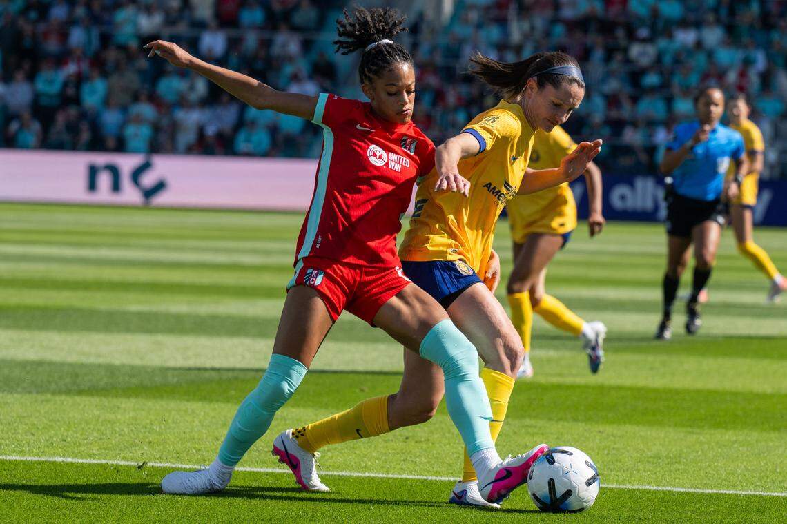 Kansas City Current midfielder Croix Bethune (8) attempts to steal the ball from a Utah Royals player, on Saturday, March 14, 2026, at the CPKC Stadium. The Current won 2-1 against the Utah Royals.