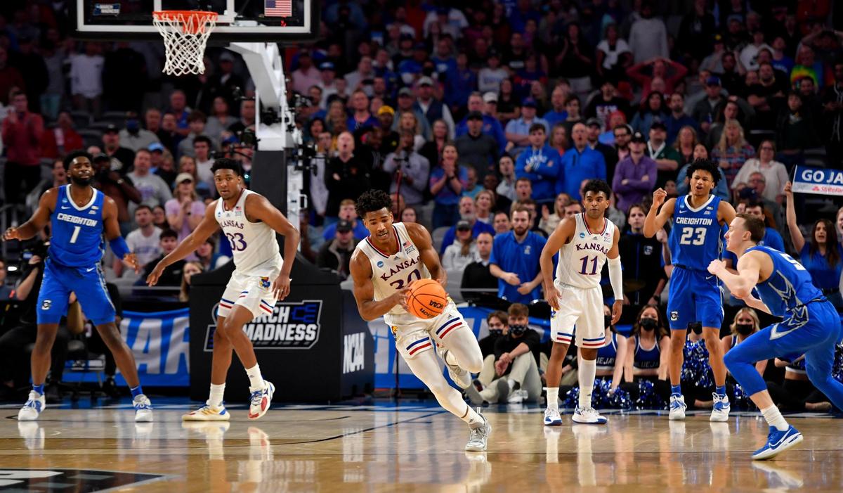 KU’s Ochai Agbaji picked up a deflected pass in the closing minutes and then raced down court for a dunk, helping the Jayhawks secure a 79-72 win over Creighton in a second round NCAA Tournament game Saturday in Fort Worth, Texas.