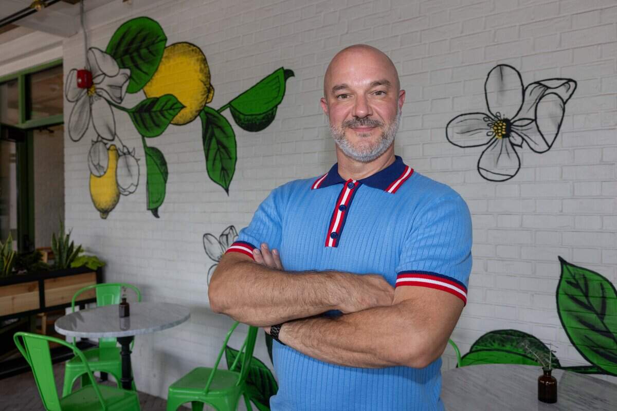 Regional Operations Manager Kenny Barsalou stands on the patio outside the new Flower Child restaurant on Friday, Aug. 7, 2026.