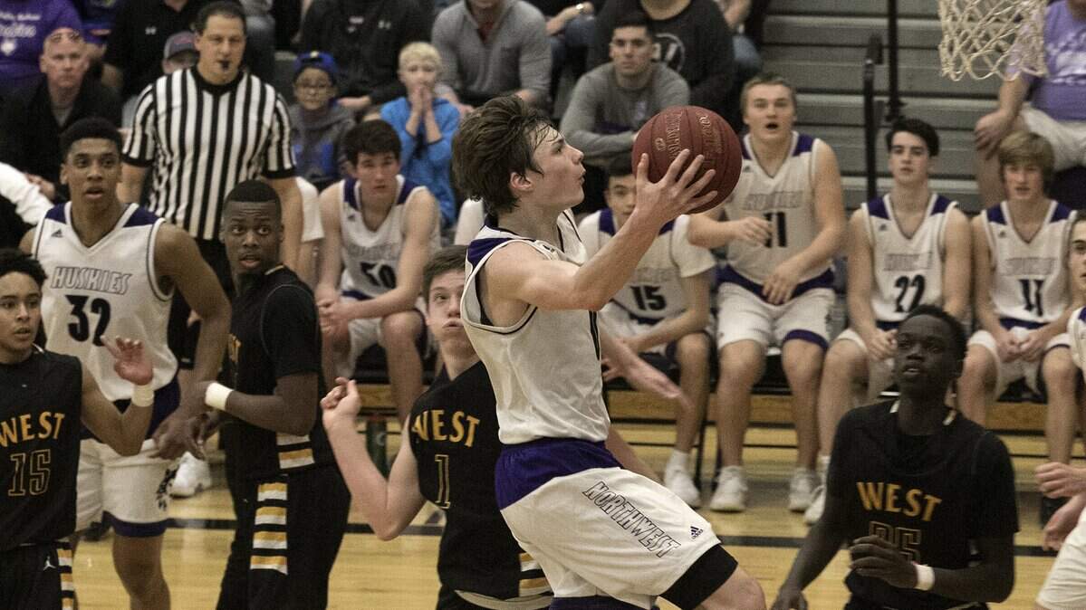 Christian Braun, of Blue Valley Northwest, went up for a basket in a substate final against Shawnee Mission West in March at Blue Valley Northwest high school.