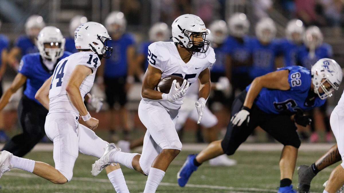Mill Valley’s Reggie Reece rushed for three touchdowns Friday night to help Mill Valley to a 41-35 win at Gardner Edgerton.