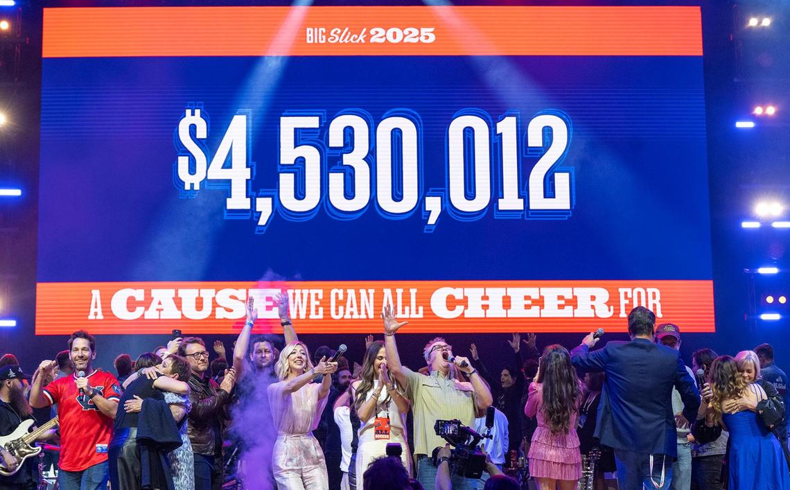 The cast of celebrities in the Big Slick Party and Show celebrate after revealing the record high amount raised for Children’s Mercy Hospital on Saturday, May 31, 2025, at the T-Mobile Center in Kansas City.