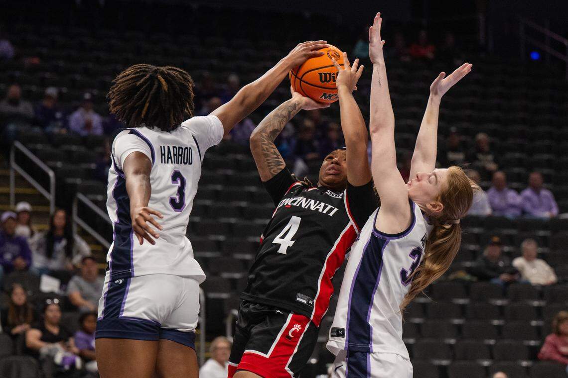 Cincinnati Bearcats guard Caliyah Devillasee (4) gets denied by Kansas State guard Brandie Harrod (3) during the first half of the Wildcats’ first-round game vs. the Cincinnati Bearcats. The Wildcats won 91-66.