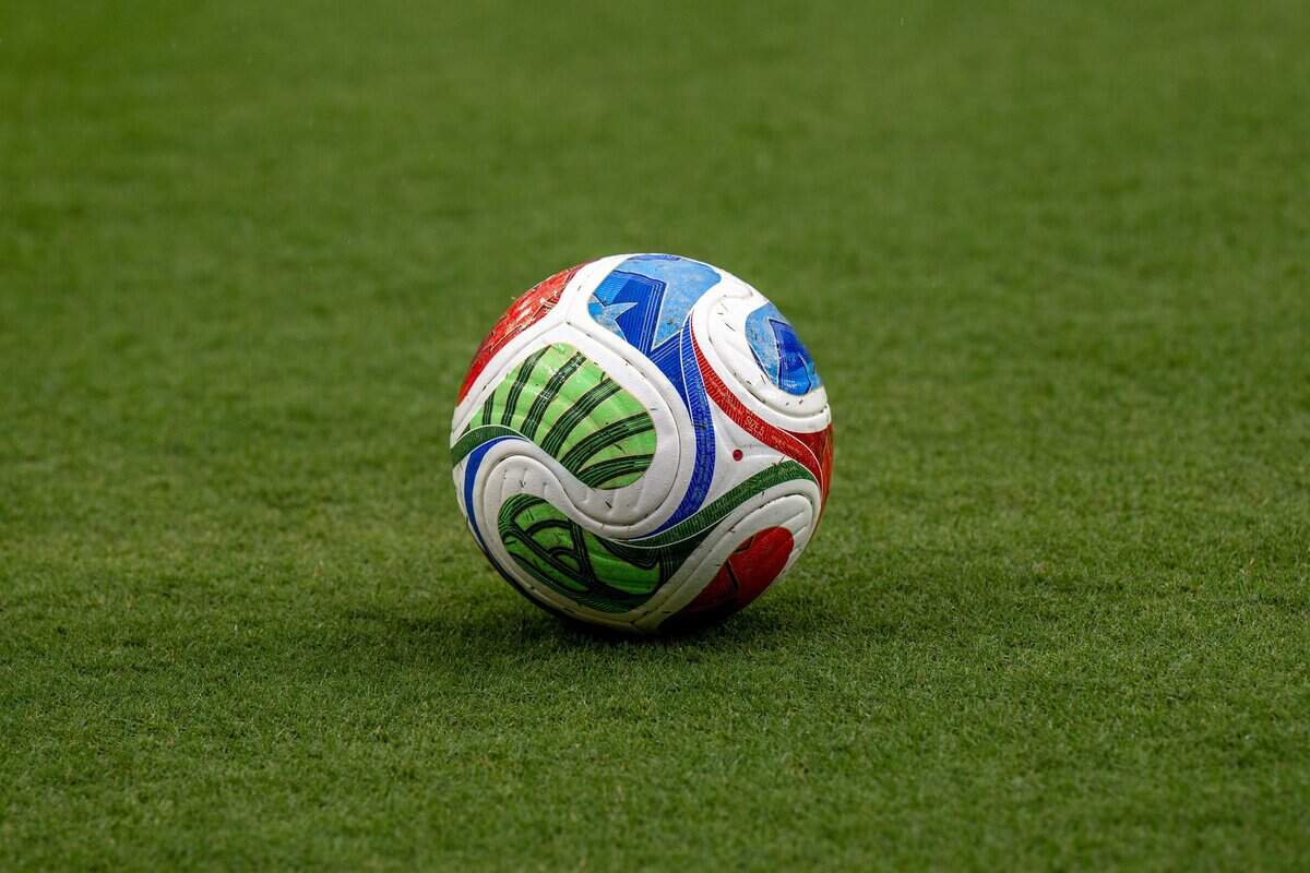 The official FIFA World Cup ball sits on the field before a FIFA World Cup group-stage soccer match between the Netherlands and Tunisia at Kansas City Stadium on Thursday, June 25, 2026.