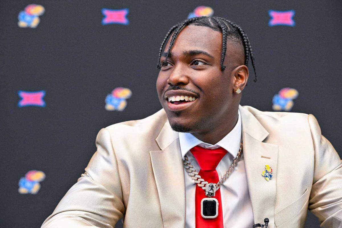 Kansas Jayhawks quarterback Jalon Daniels is interviewed during Big 12 football media days at AT&T Stadium on Wednesday.
