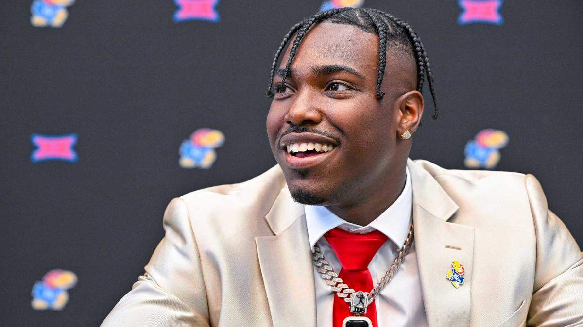 Kansas Jayhawks quarterback Jalon Daniels is interviewed during Big 12 football media days at AT&T Stadium in early/mid-July.