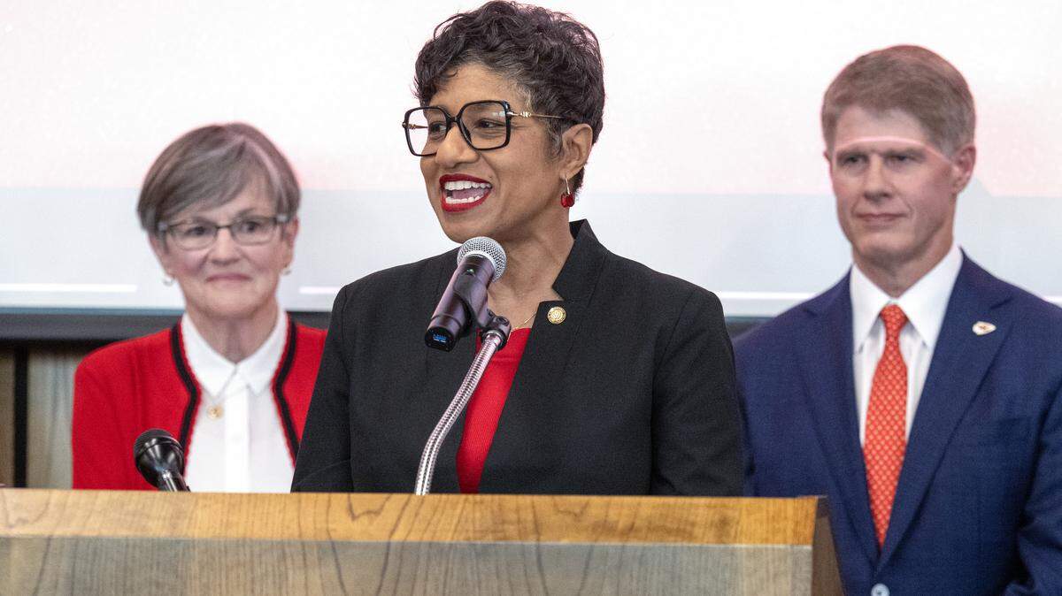 Christal Watson, Mayor of Kansas City, Kansas, addresses the crowd after Governor Laura Kelly’s announcement on Monday, Dec. 22, 2025, that the Kansas City Chiefs will build their new stadium in Kansas City, Kansas. Chiefs owner Clark Hunt looks on.