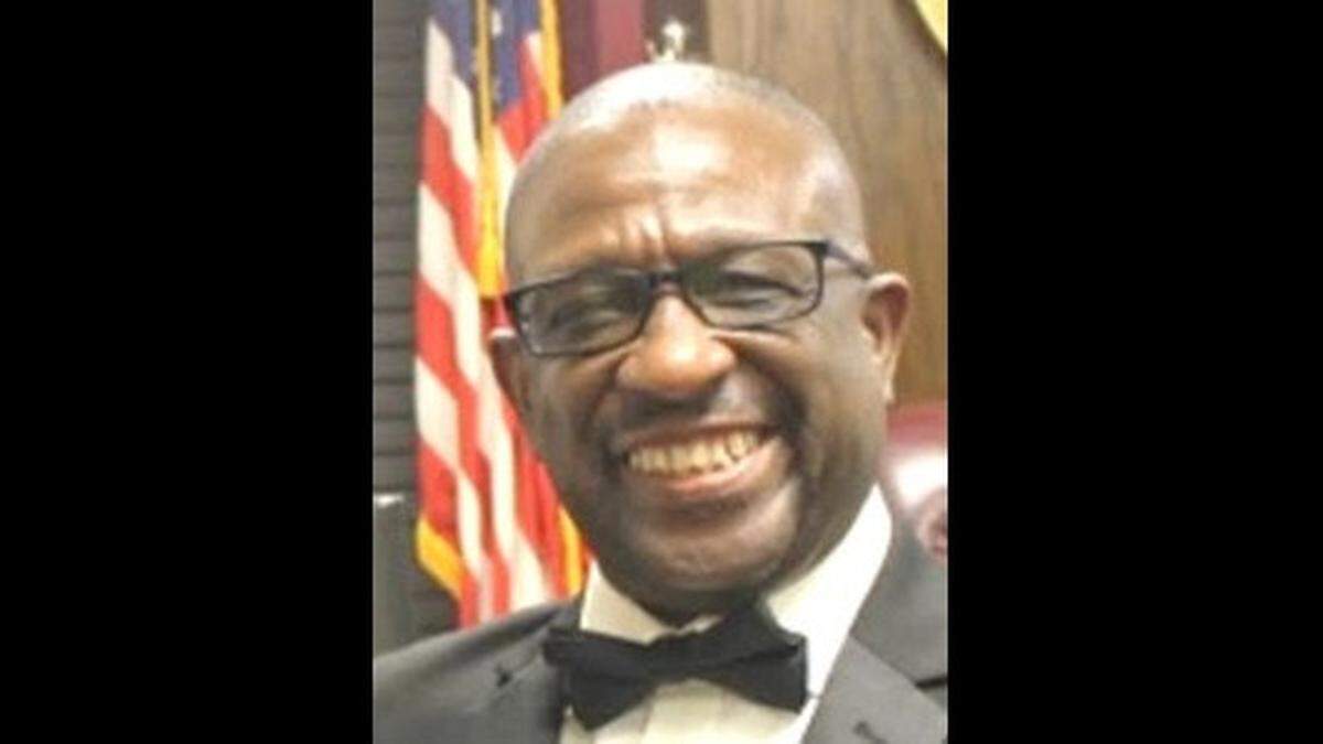 Reuben Howell beams in a black tux. He got married two years ago to his high school sweetheart, the woman he had vowed to marry much sooner until the Army and life got in the way.