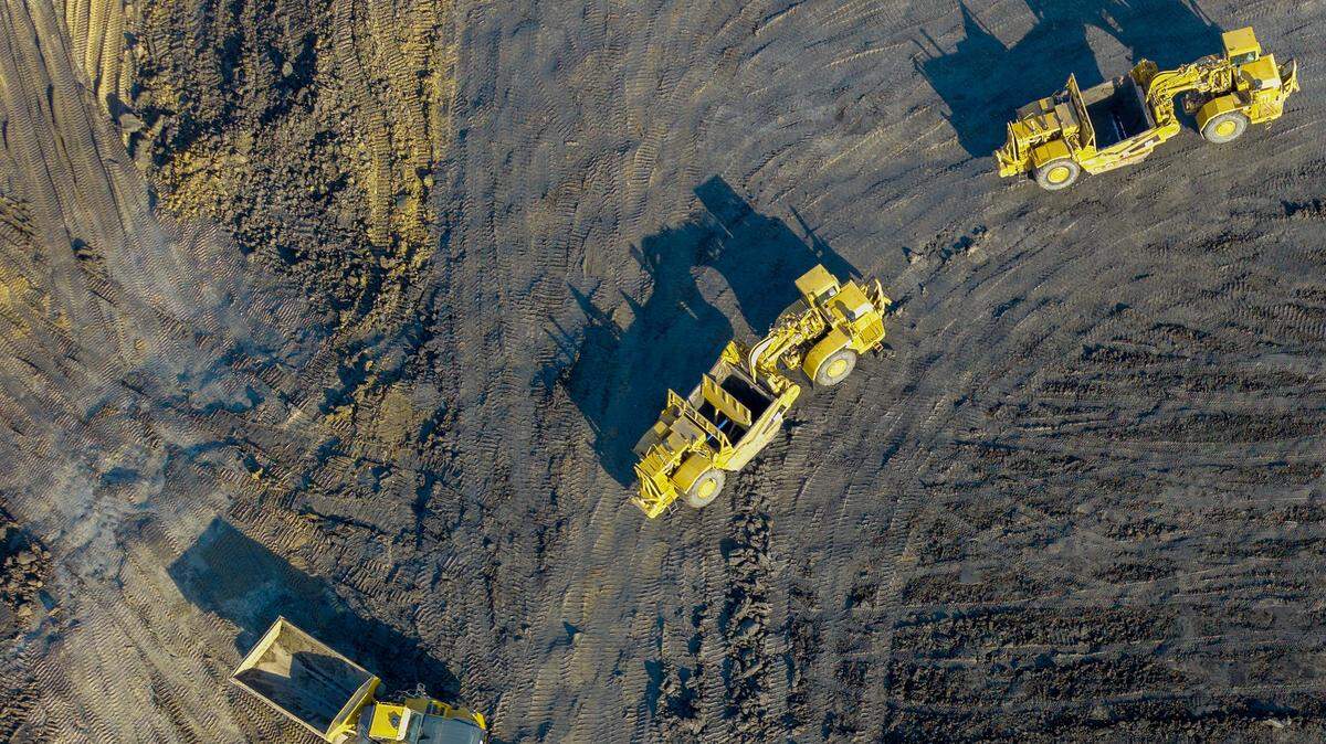 Heavy equipment works on the site of a proposed supersize data center on Bly Road in eastern Independence on Friday, Feb. 13, 2026. Nearby residents oppose the planned 400-acre, $6.6 billion AI facility.