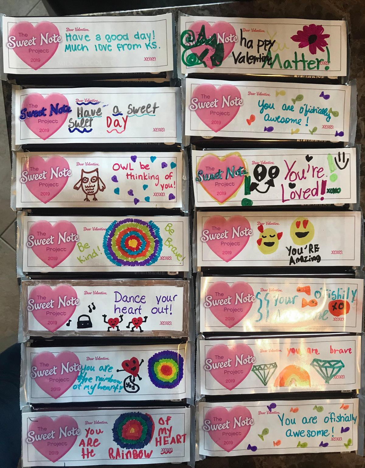 In advance of the first anniversary of the mass school shooting that claimed 17 lives, Missy Pint of Lenexa delivered 3,550 Sweet Notes, chocolate bars adorned with handwritten notes of love and inspiration, to Marjory Stoneman Douglas High School in Parkland, Fla. Students in Johnson County schools wrote the inspirational messages on the chocolate bars.