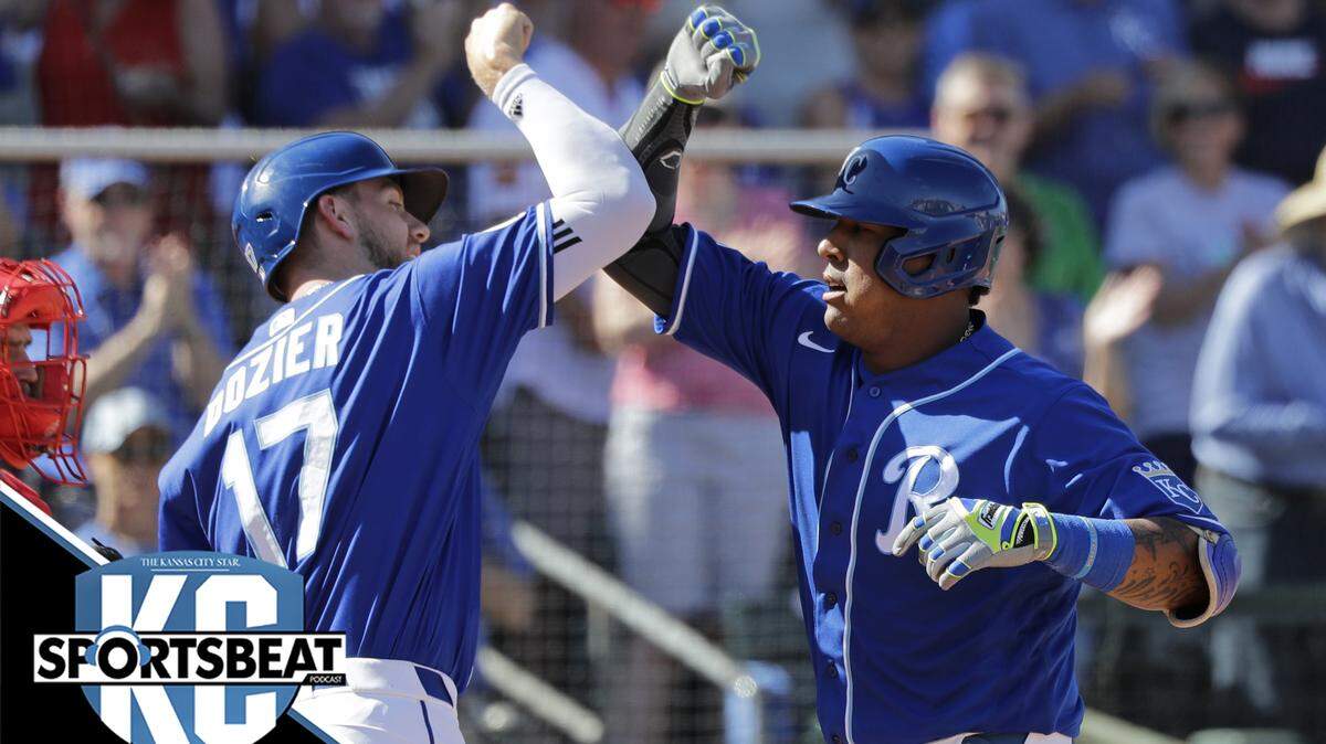 Kansas City Royals’ Salvador Perez, right, is congratulated on his two-run home run by Hunter Dozier (17) against the Los Angeles Angels in the fourth inning during a spring training baseball game Friday, March 6, 2020, in Surprise, Ariz. (AP Photo/Elaine Thompson)