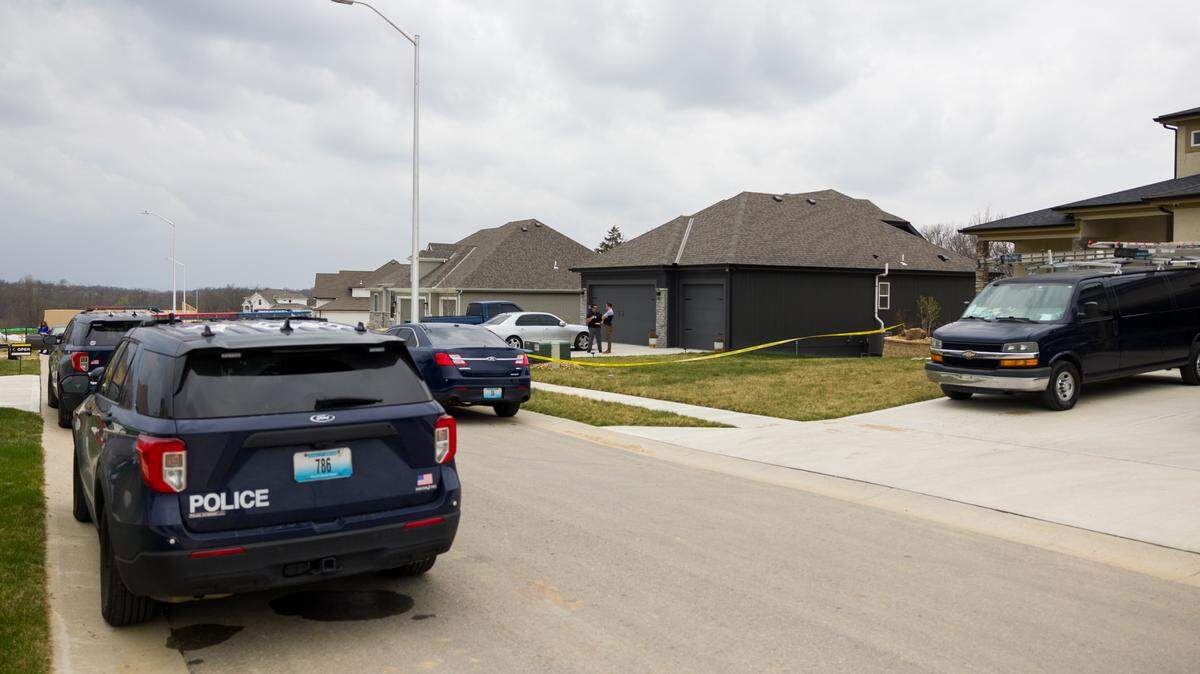 Kansas City police investigators were conducting an investigation at a Northland home where three people were found dead Monday.