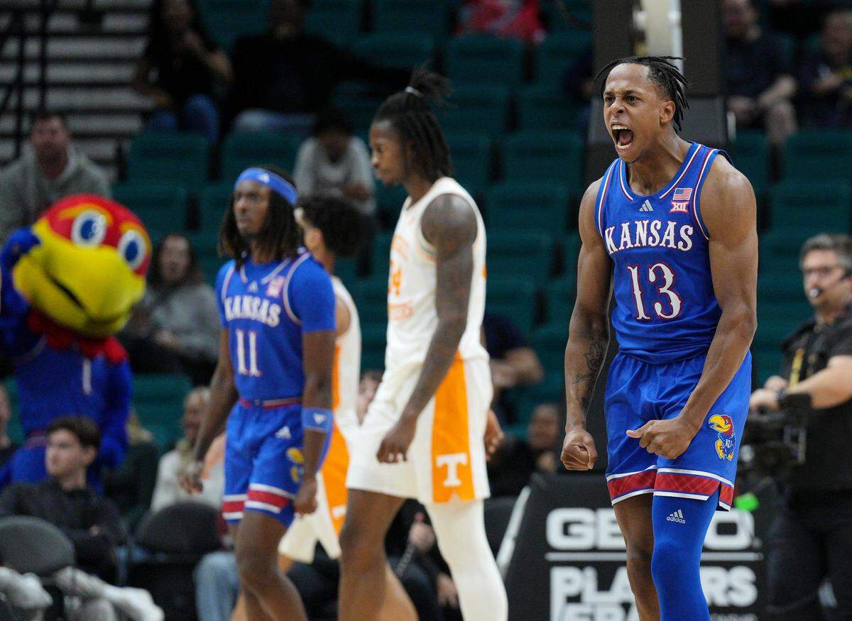 Kansas Jayhawks guard Elmarko Jackson, right, helped lead KU to a men’s basketball victory over the Tennessee Volunteers in the Players Era tournament at the MGM Grand Garden Arena in Las Vegas on Wednesday, Nov. 26, 2025.
