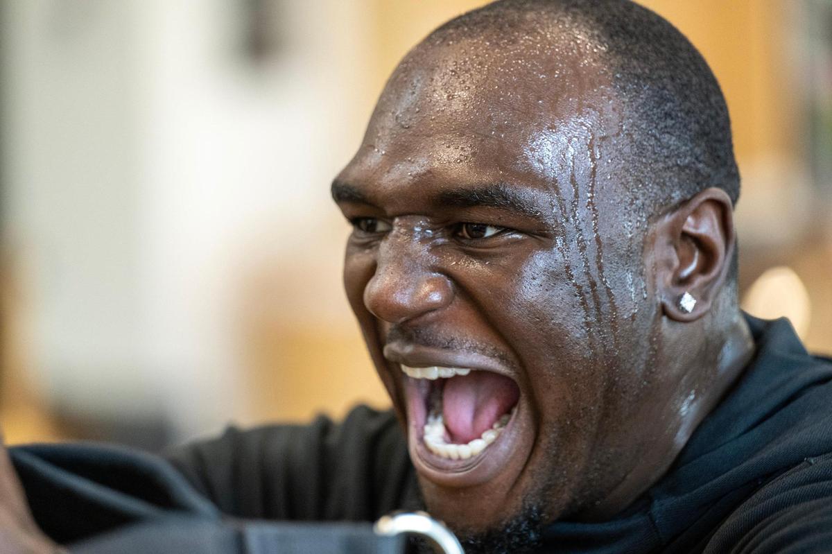 Chiefs defensive end Malik Herring lets out a yell while working out in a pilates class at Pilates By Kahley on Tuesday, Oct. 29, 2024, in Overland Park.