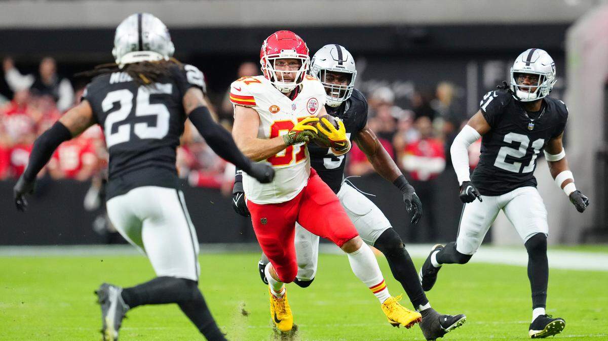 Chiefs tight end Travis Kelce (No. 87) gains yards after a catch against the Raiders during Sunday’s game at Allegiant Stadium in Las Vegas.