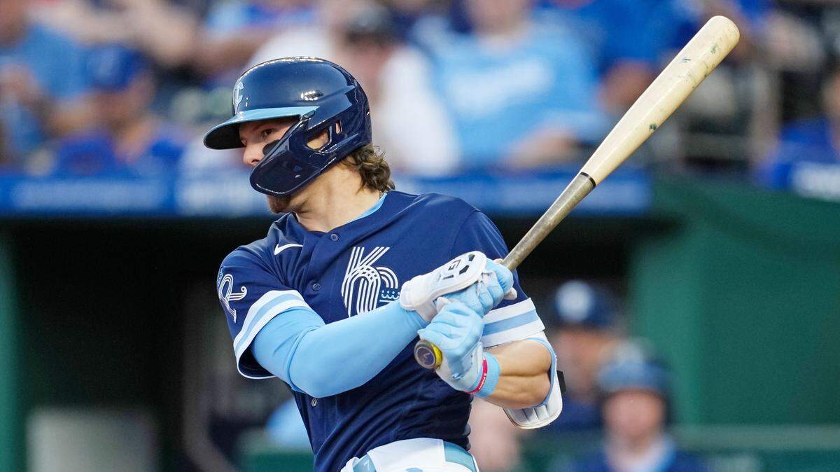 Kansas City Royals shortstop Bobby Witt Jr. hits a double during the fourth inning against the Washington Nationals at Kauffman Stadium on May 26, 2023.