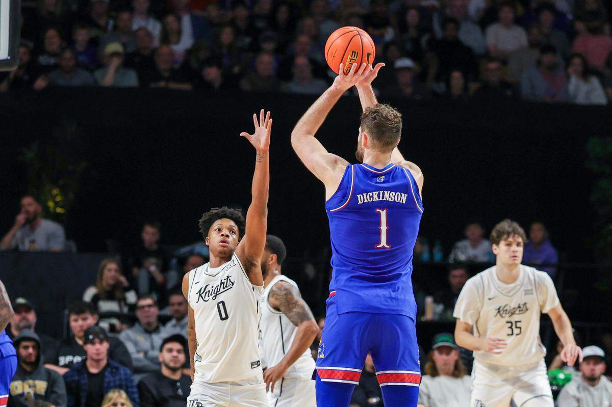 Kansas Jayhawks center Hunter Dickinson puts up a shot against the UCF Knights during a Sunday, Jan. 5, 2025 men’s basketball game at Addition Financial Arena in Orlando.