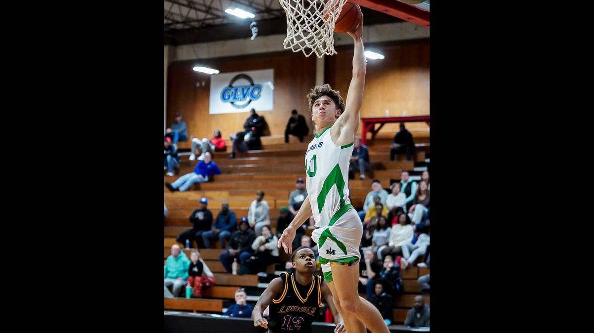Nick DeVoss shoots a layup during St. Michael the Archangel’s first-round win at the Jewell Classic basketball tournament on Friday, Dec. 27, 2024 at William Jewell College in Liberty.