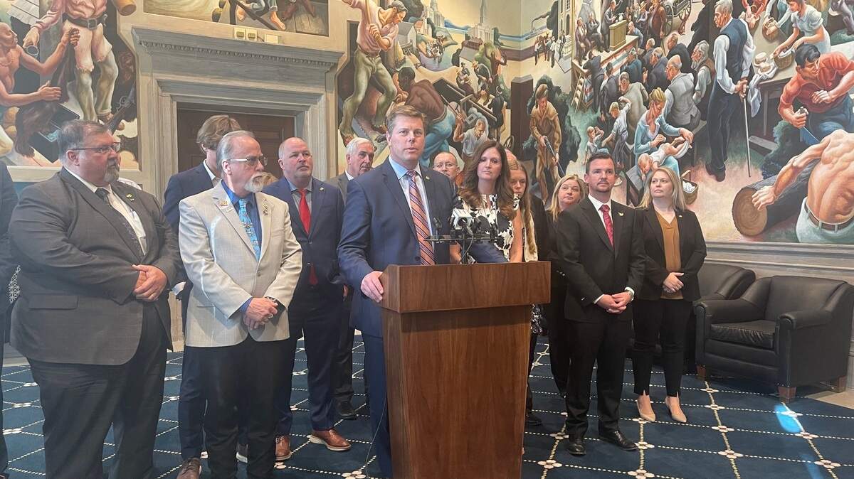 Missouri House Speaker Dean Plocher, a St. Louis-area Republican, speaks with reporters after the House Ethics Committee voted to dismiss a complaint of ethical misconduct against the top Republican.