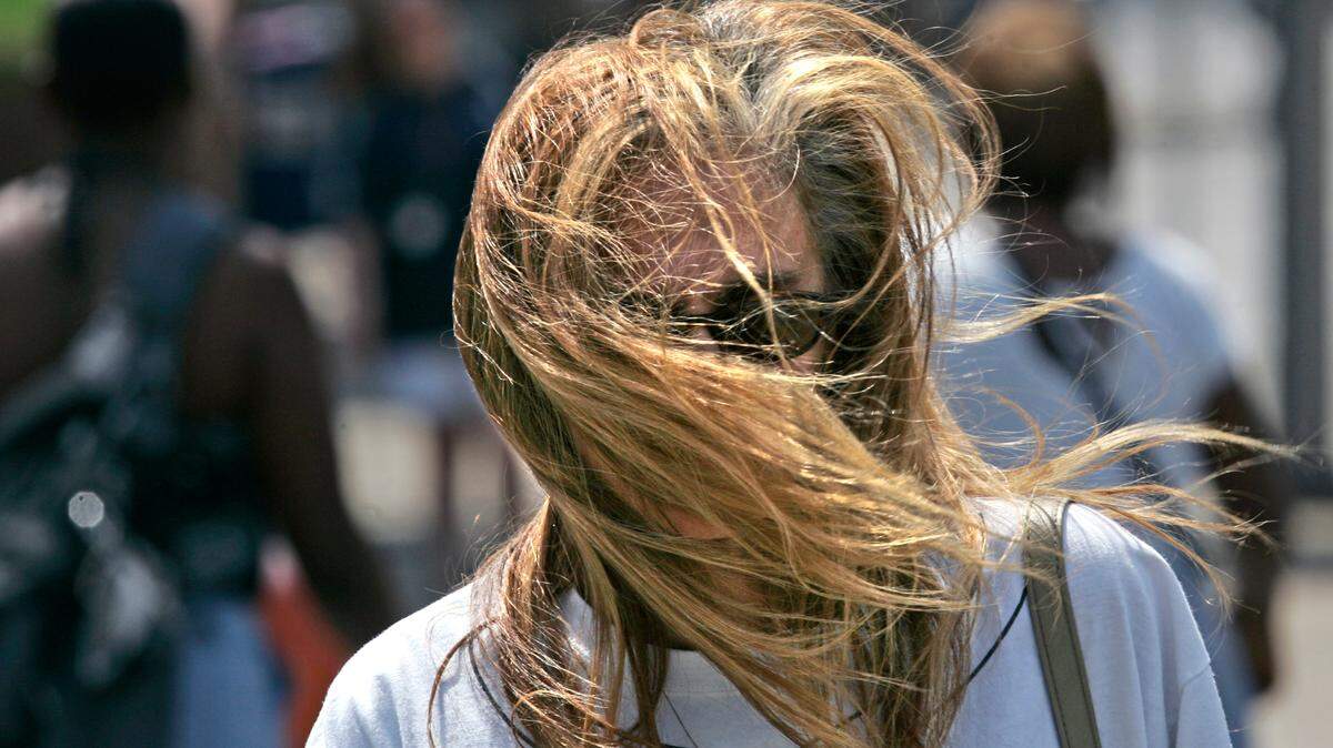 FILE PHOTO. Gusty winds blow in downtown Kansas City.